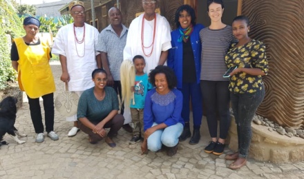 The Obi of Onitsha with the staff of Zoma Museum, Addis Ababa. Holding his Otinri (horse tail) is the little son of the founder.